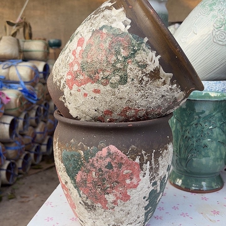 红陶油画两个口径20高度20