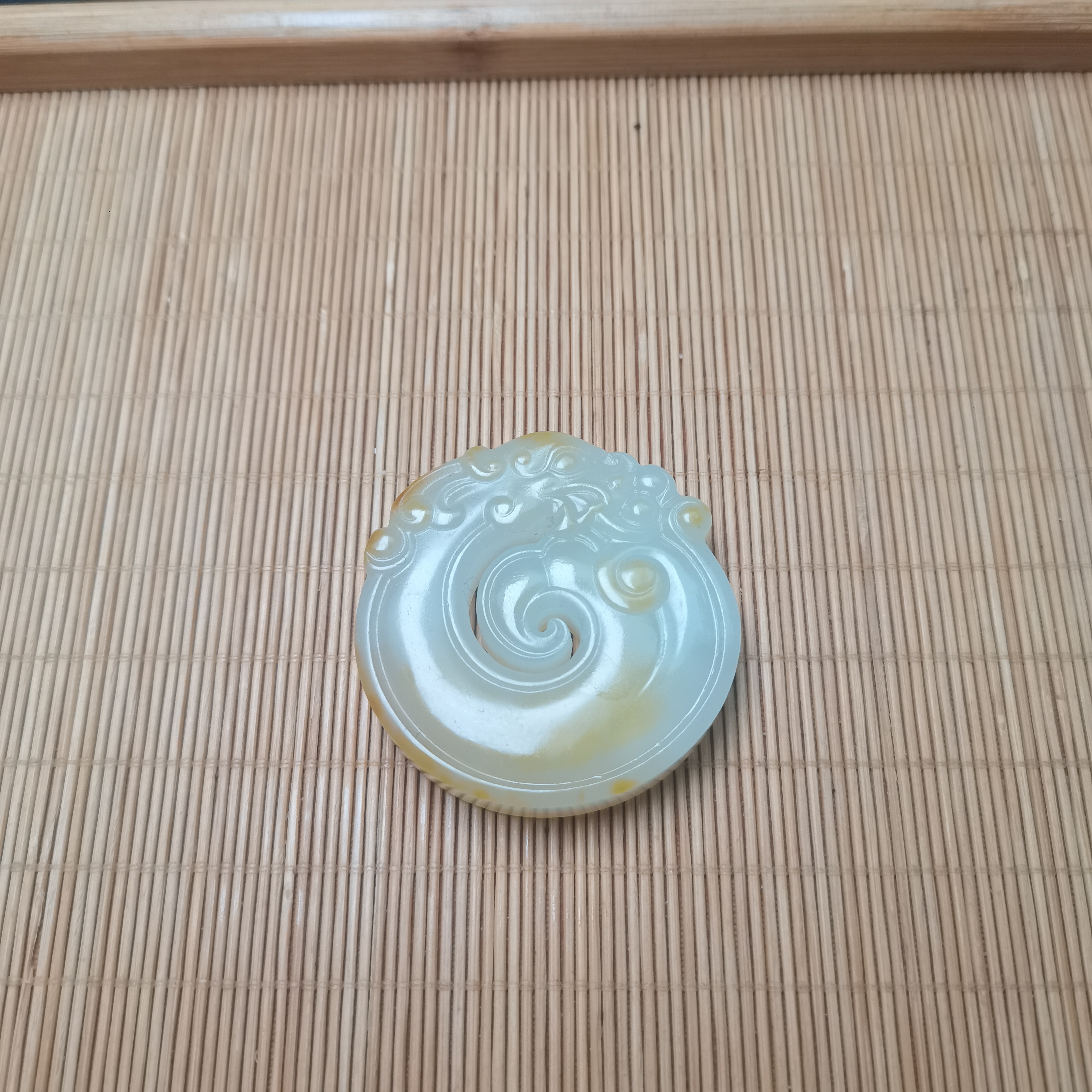 新疆和田玉龙行天下77克