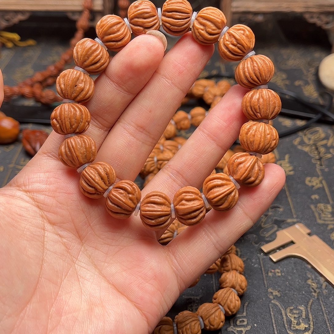 吊坠桃核佛手手串