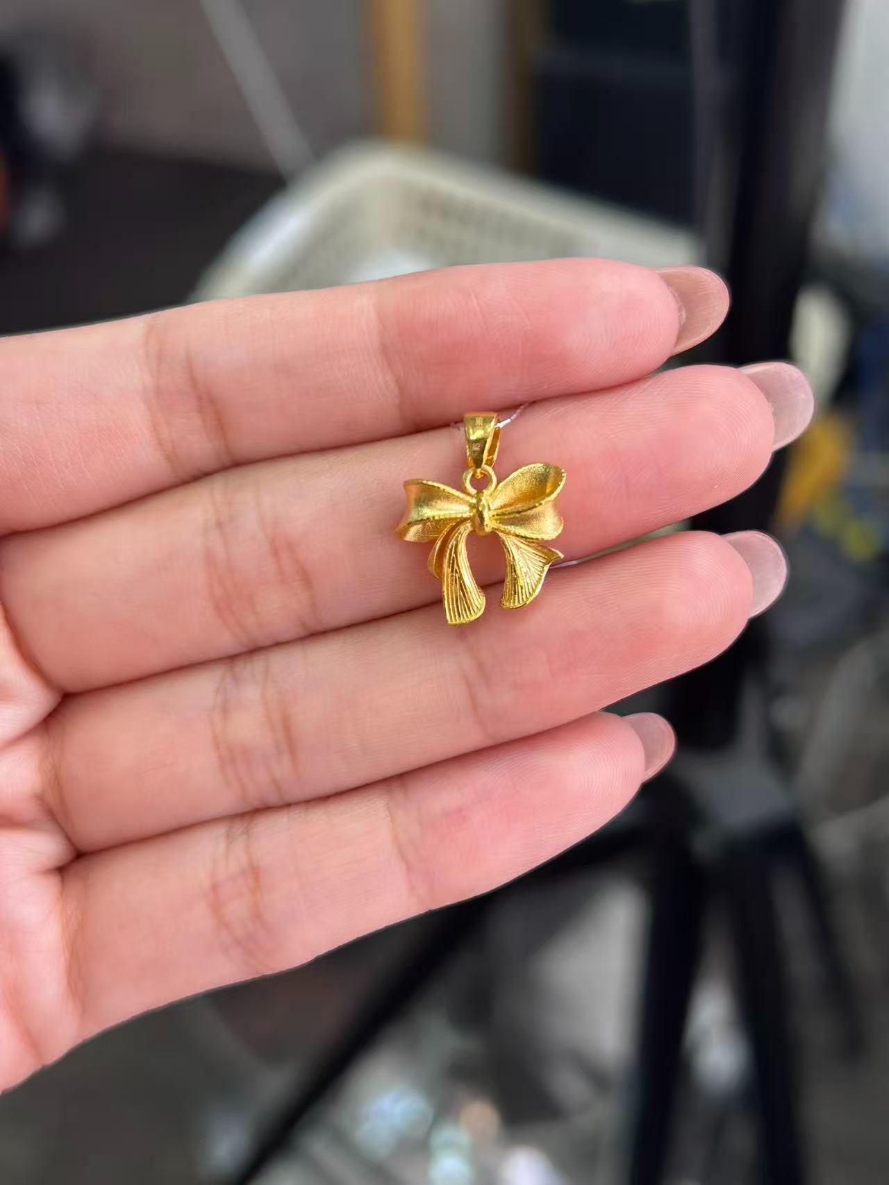    足金999  双面蝴蝶结吊坠