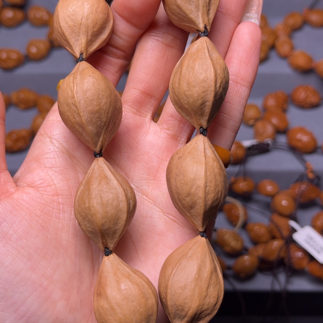 橄榄核吊坠2.1素核手持