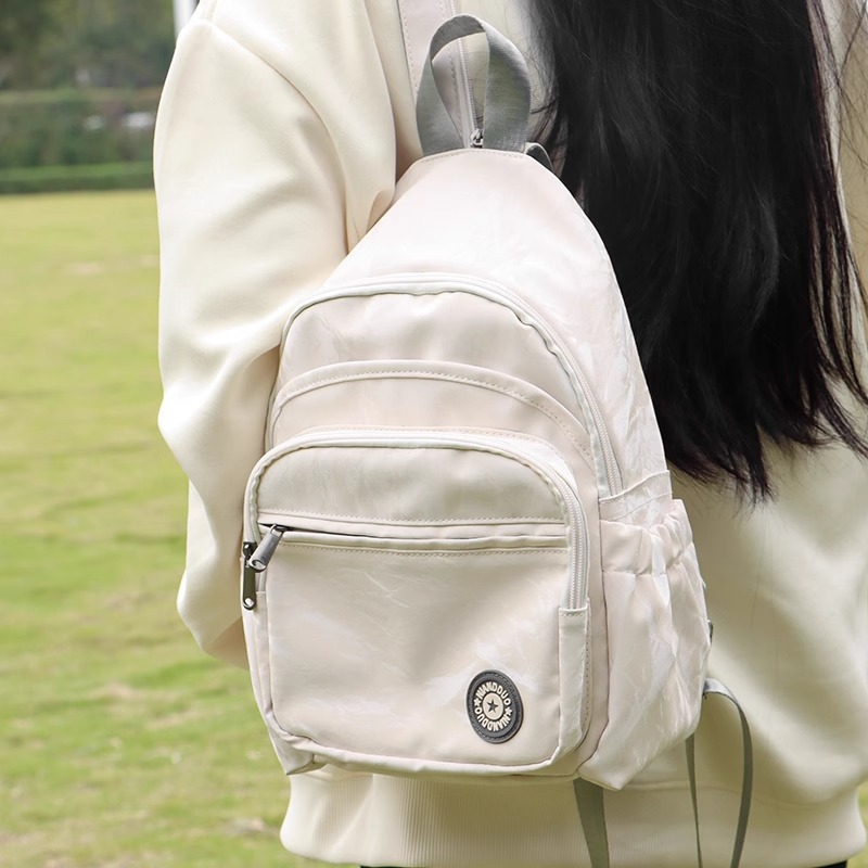 名芭双肩包女大学生高中生上班通勤简约书包新款户外出游旅行背包