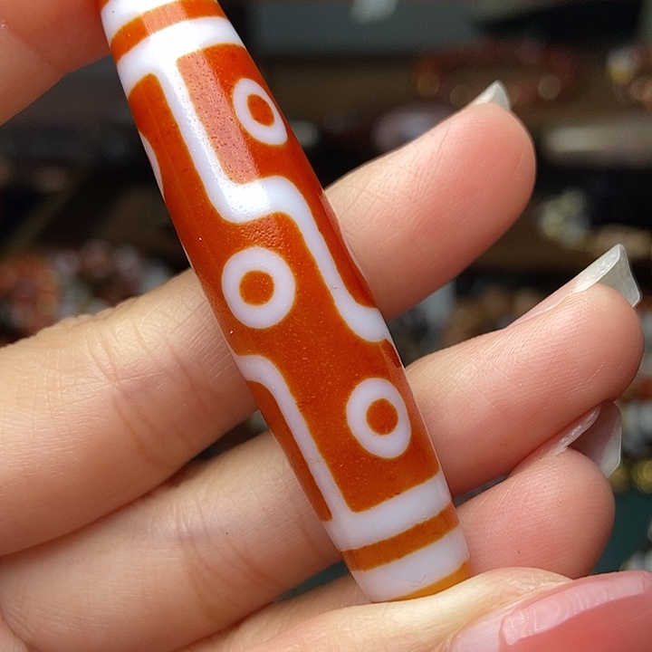 红肉九眼天珠一颗