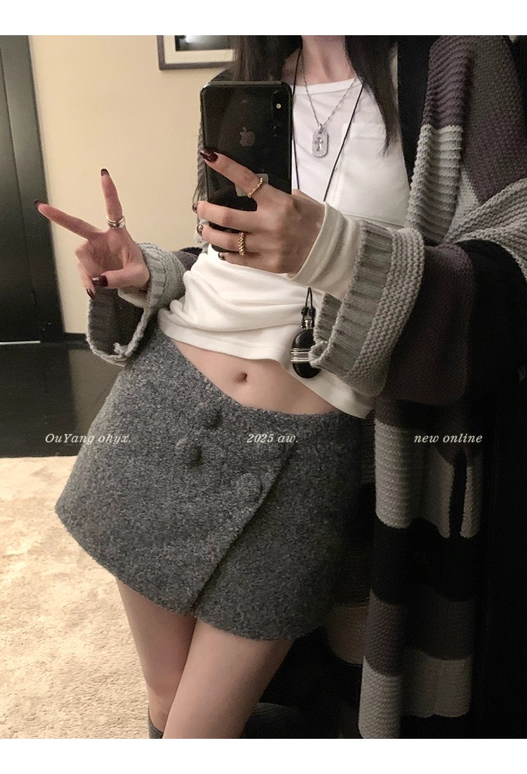 欧阳"鬼马少女"圈圈呢半身裙辣妹显瘦a字短裙裤短款多扣搭片