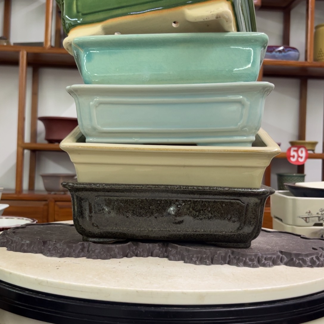 紫砂花盆瑕疵5 。2个火烈 2个不平 1个鼓包气孔走形