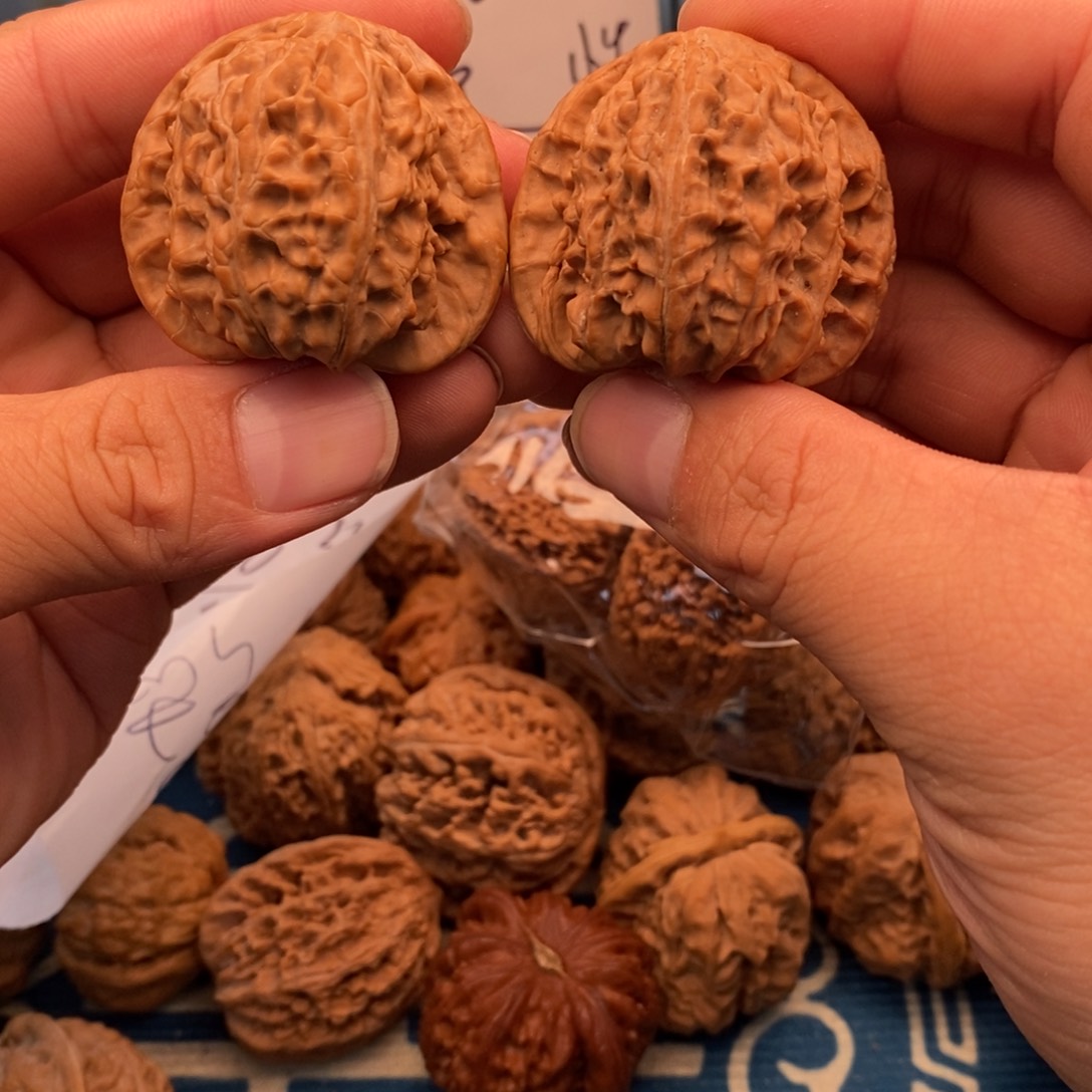 文玩核桃吊坠文玩核桃手把件白狮子毕业