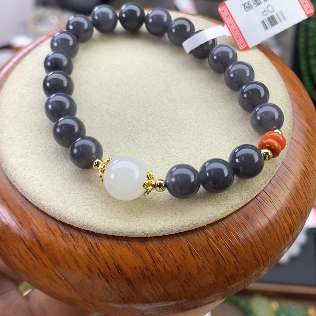 和田玉手串未镶嵌一***?烟紫卡8