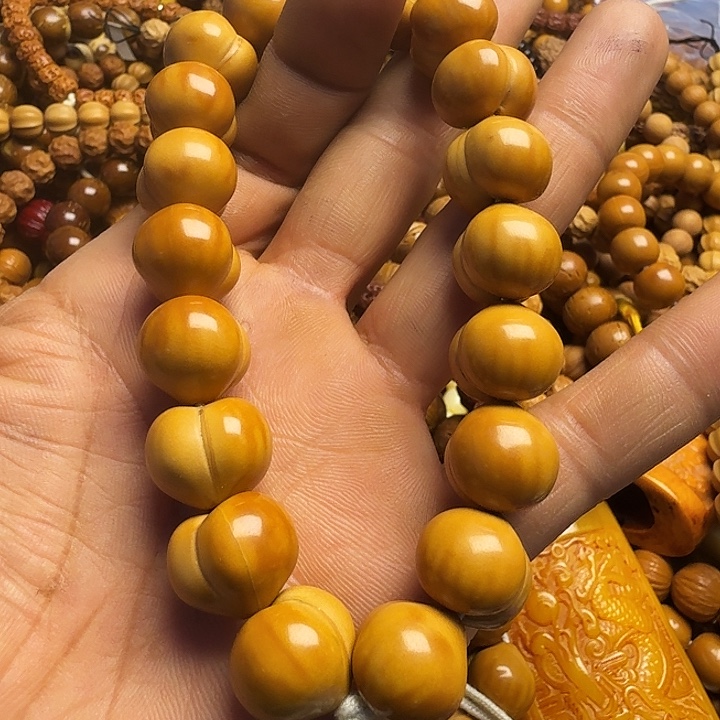 大***儿猴头核桃手串微瑕屁桃