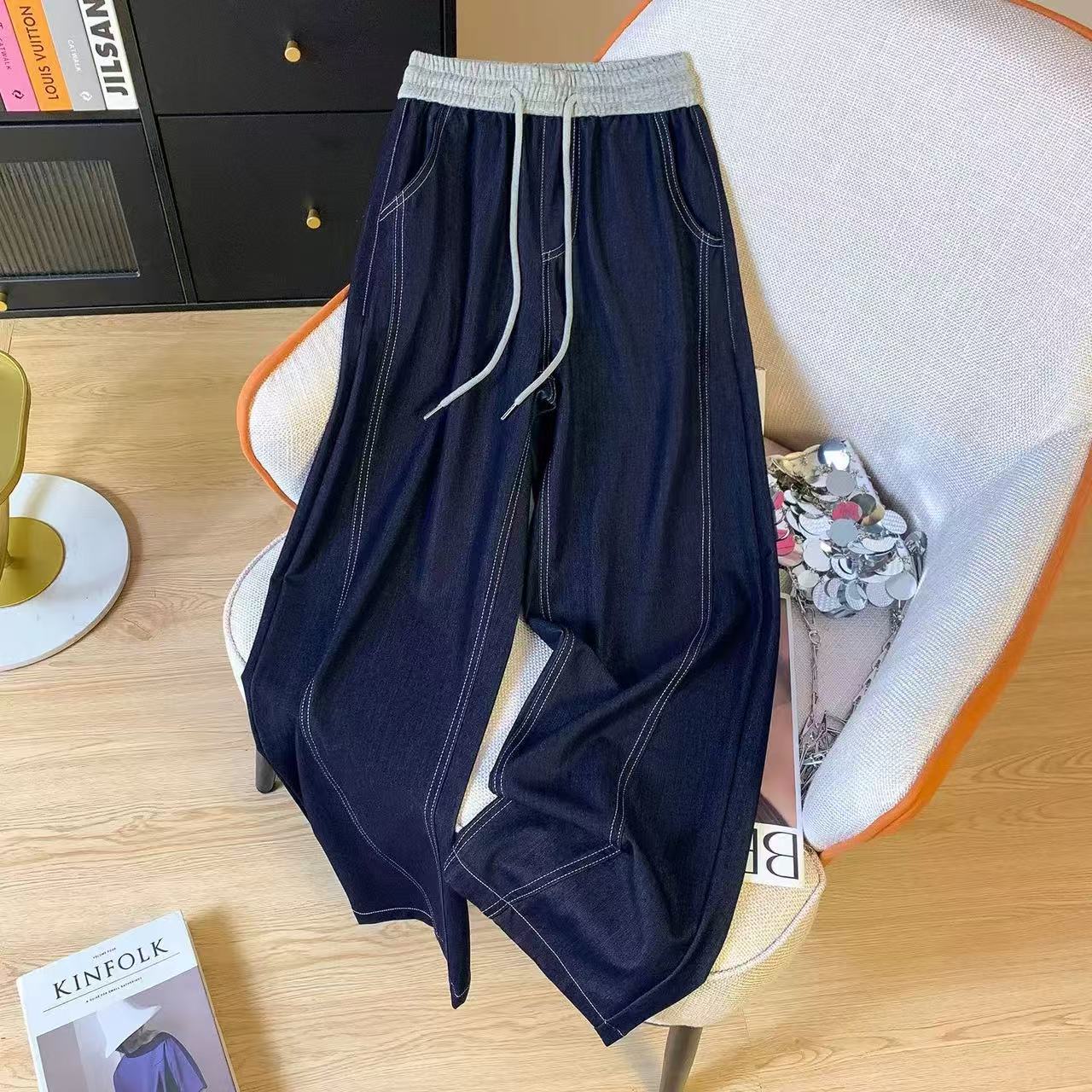 女士薄牛仔弯刀裤