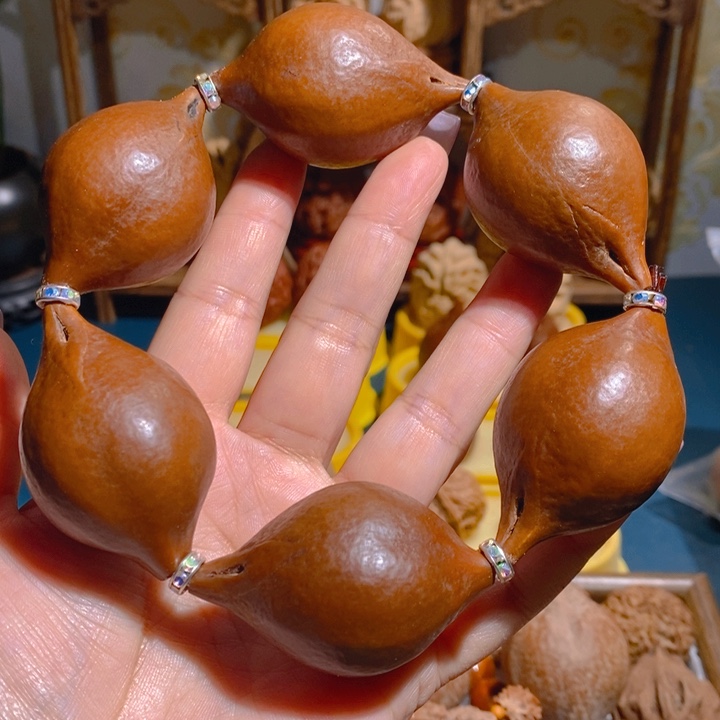 野生大橄榄核手持