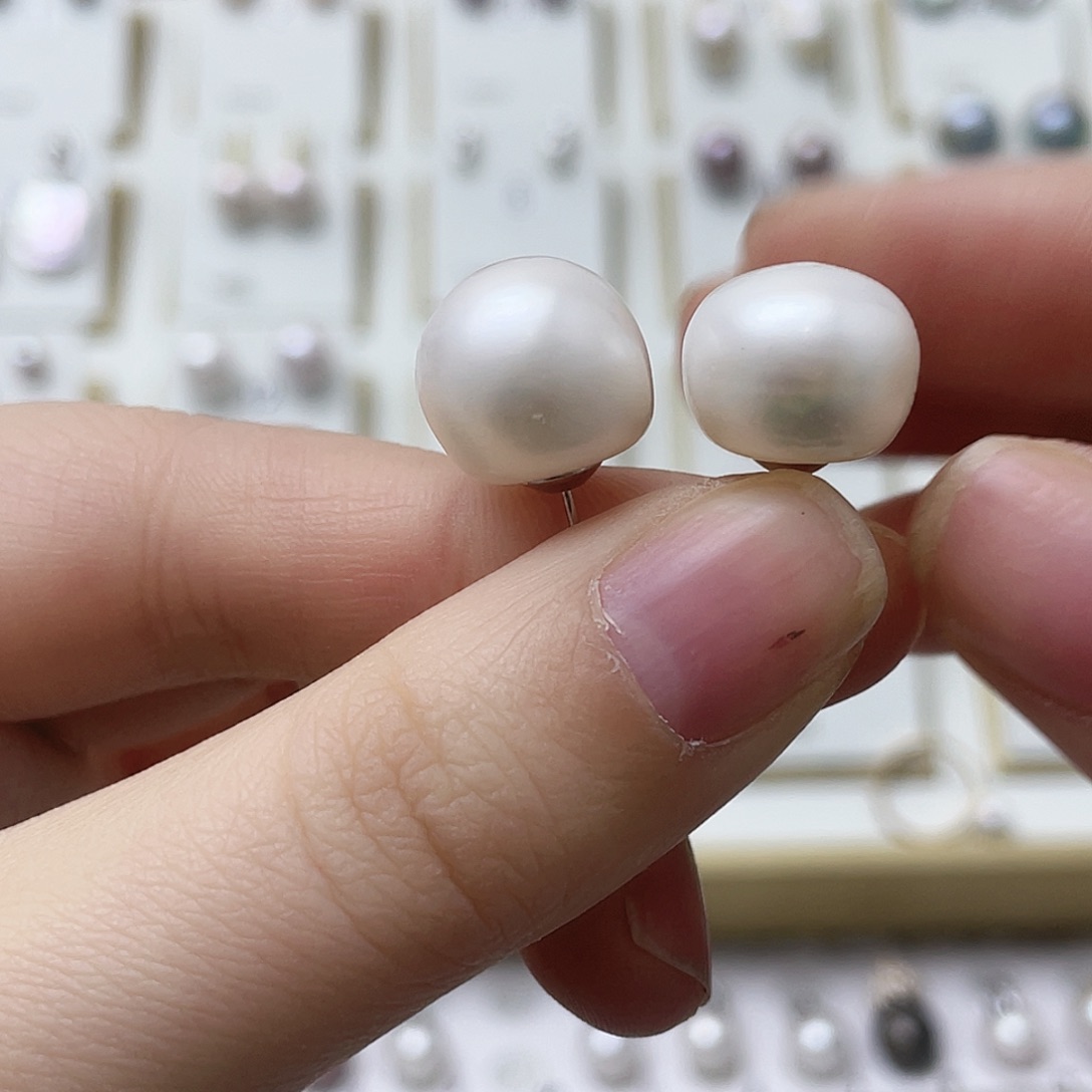 潇***潇银S925镶嵌淡水珍珠耳饰