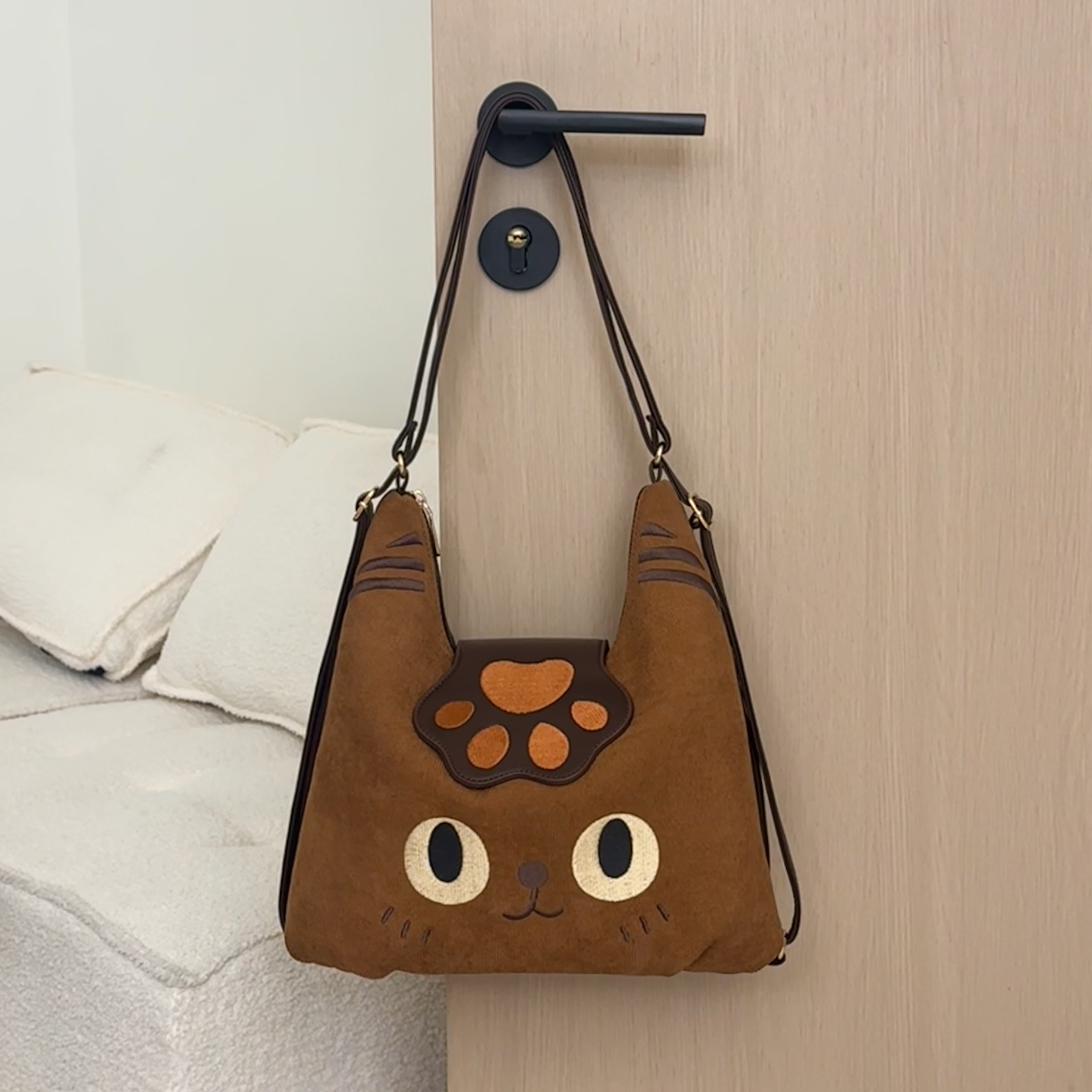 大容量可爱猫爪大眼睛卡通大学生时尚百搭潮流单肩斜挎双肩包包