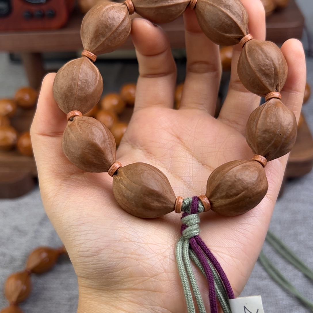圆***中手串橄榄核三花梅林铁核手串