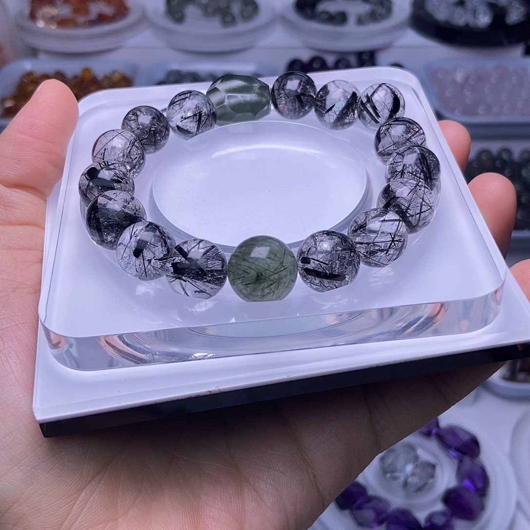 孙***薪水晶手串未镶嵌打孔不退换