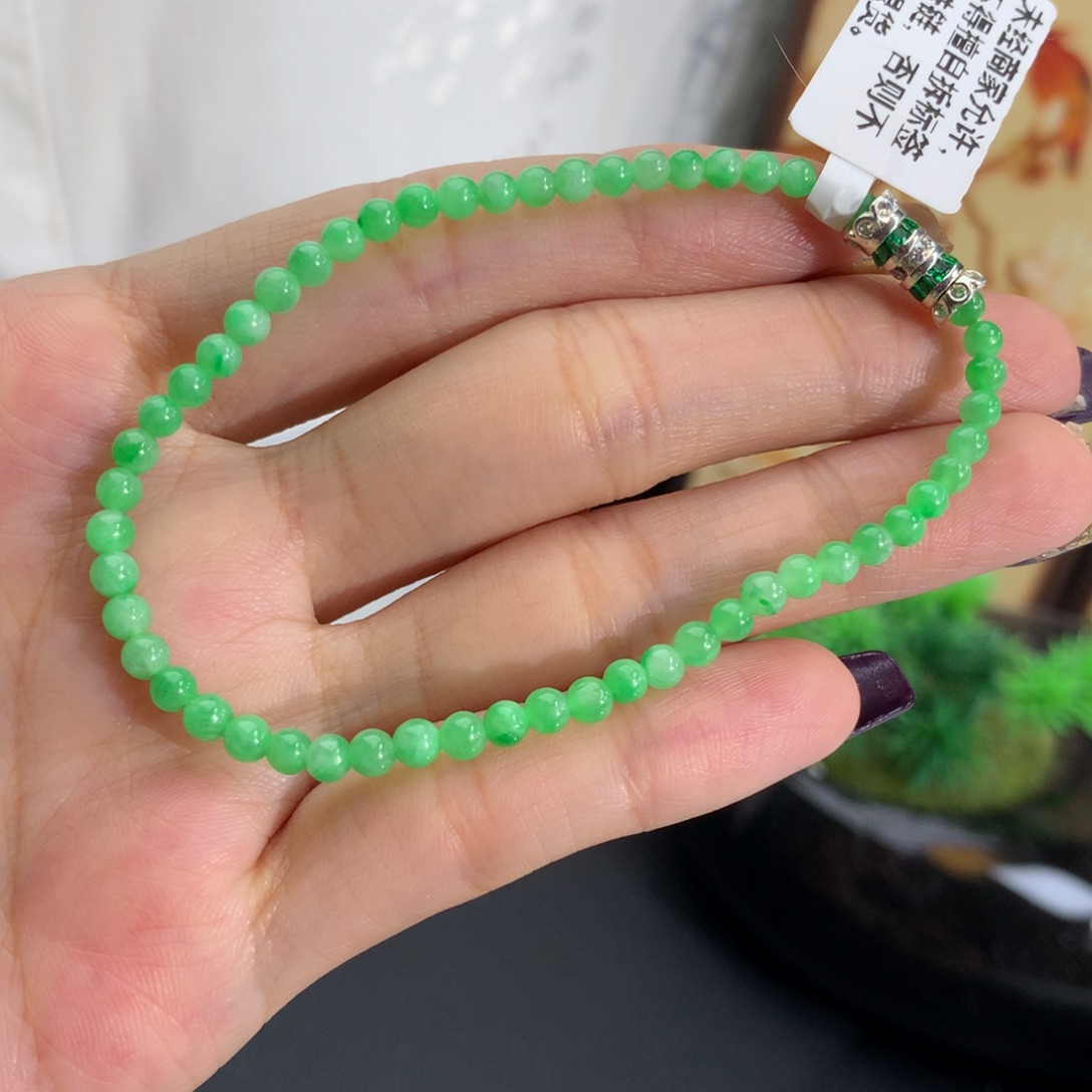 和***璧翡翠未镶嵌手串卡3-3.5果阳绿小米手串