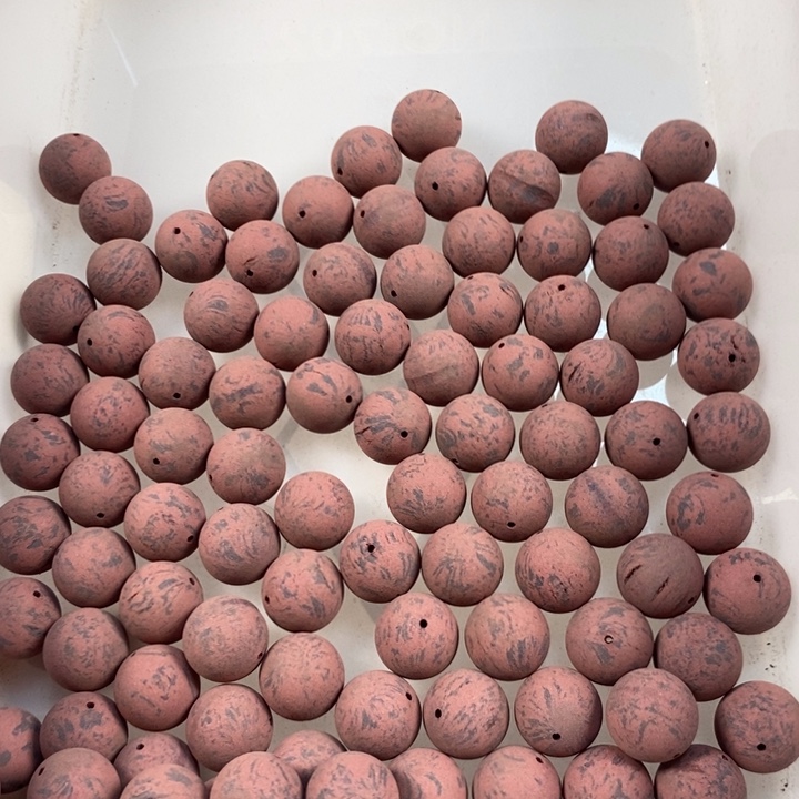 泥塑苏合紫星1.5打孔半成品瑕疵珠约200克