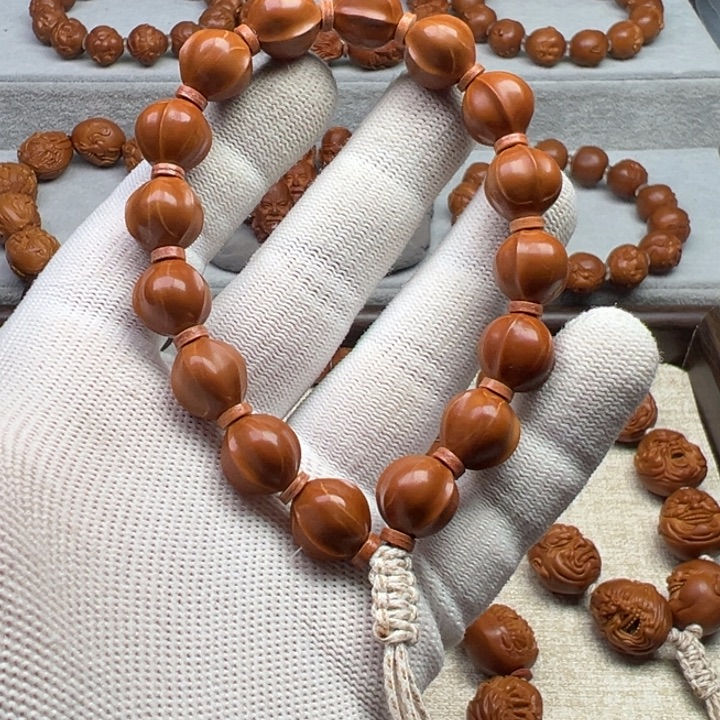 大***8橄榄核手串橄榄核雕工艺制作