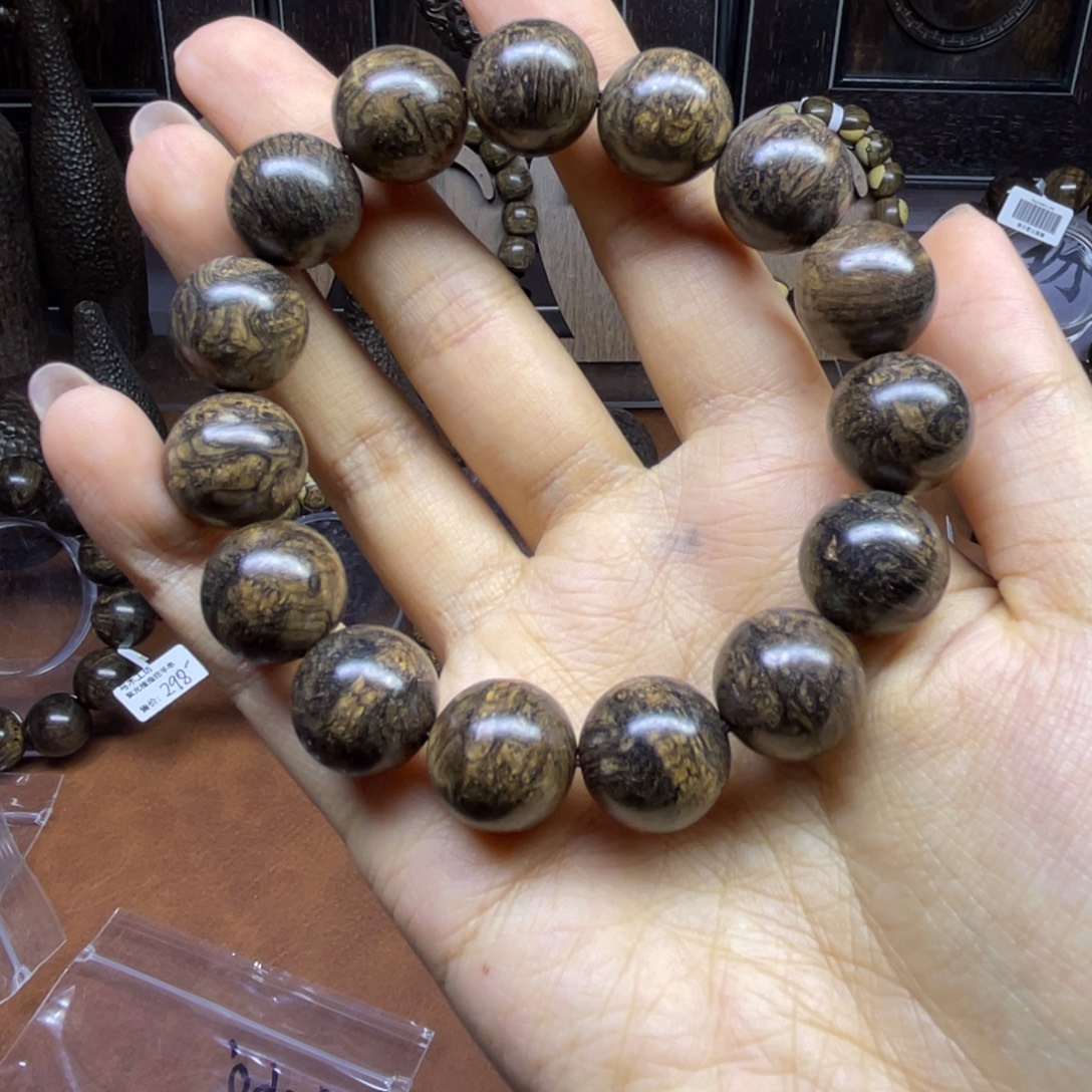 蚊***丐东非黑黄檀（紫光檀）把件