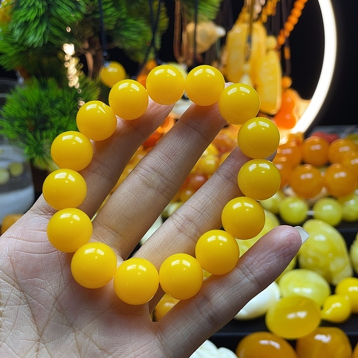 英***宝非金属鸡油黄手串