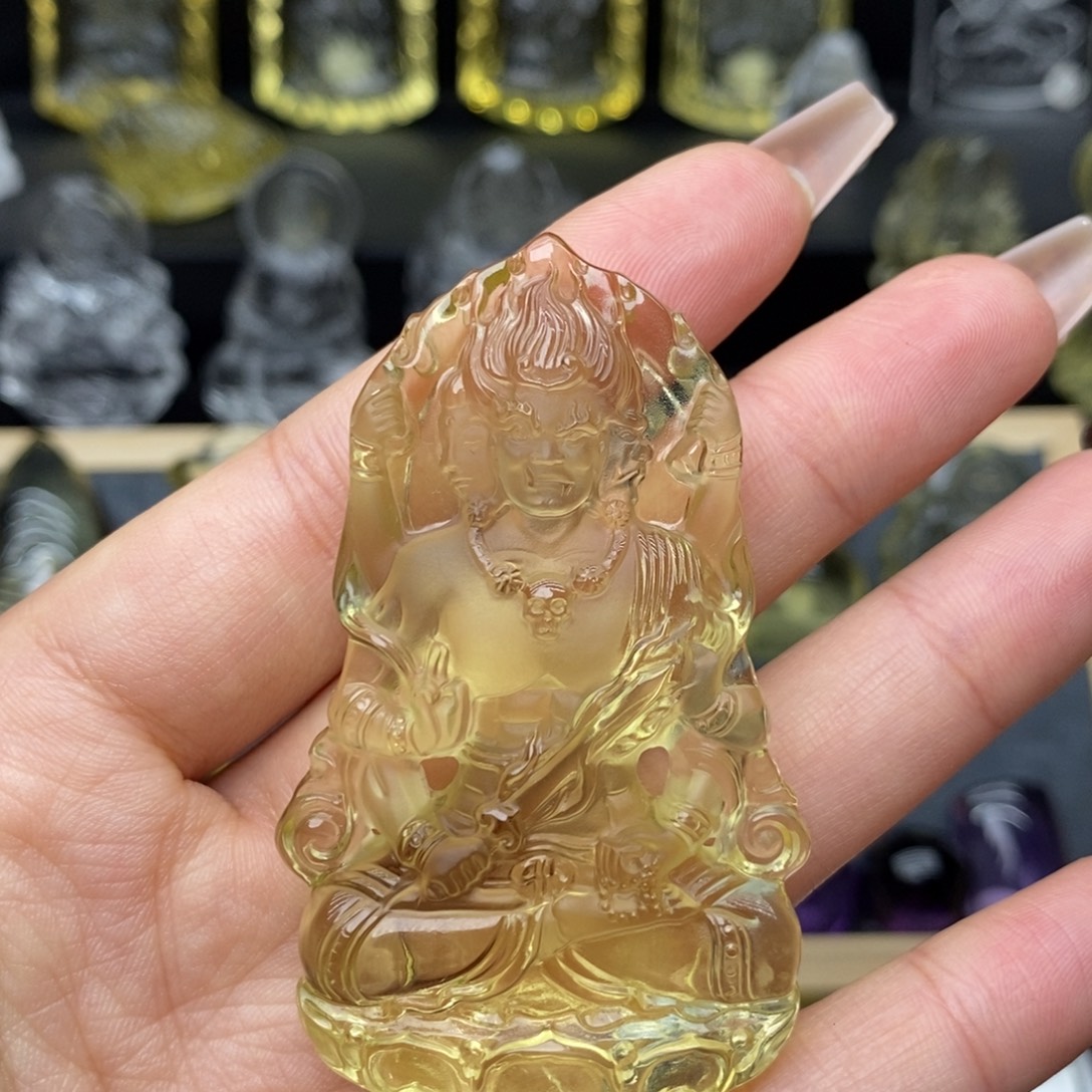 重***属未镶嵌水晶颈饰黄水晶不动尊
