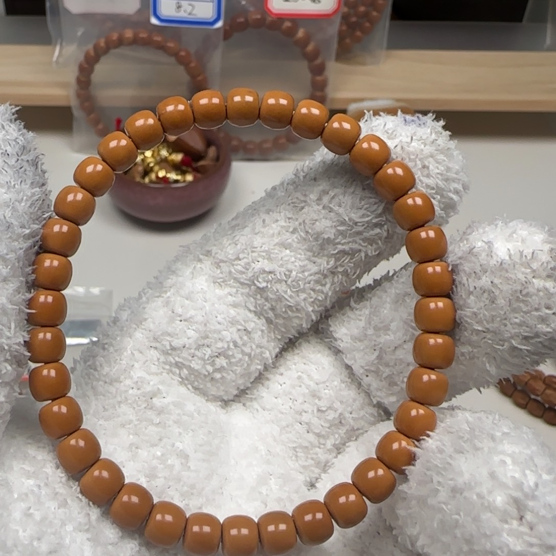 橄榄核手串老挝单圈面无白微花6.5福利