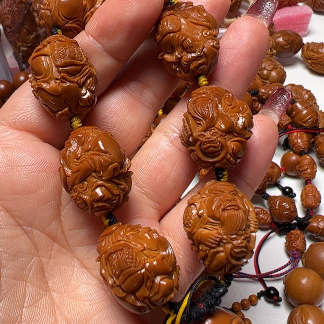 橄榄核手串大***叔橄榄核雕