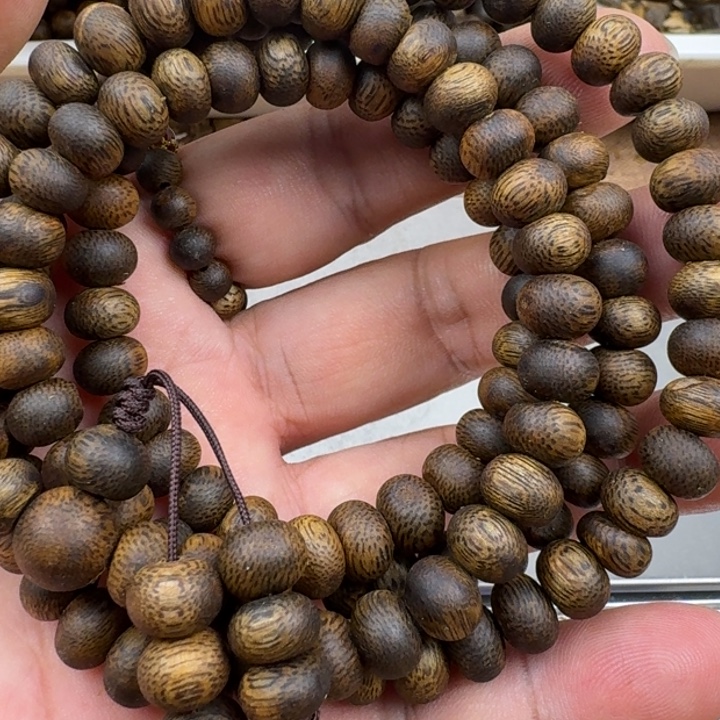 自***报手串沉香张勺子手串25克加