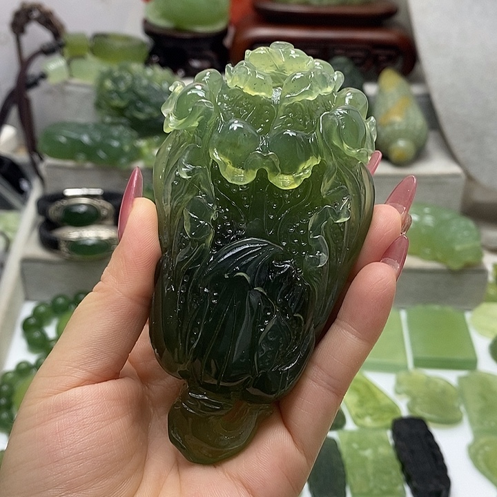 未镶嵌蛇纹石玉手把件