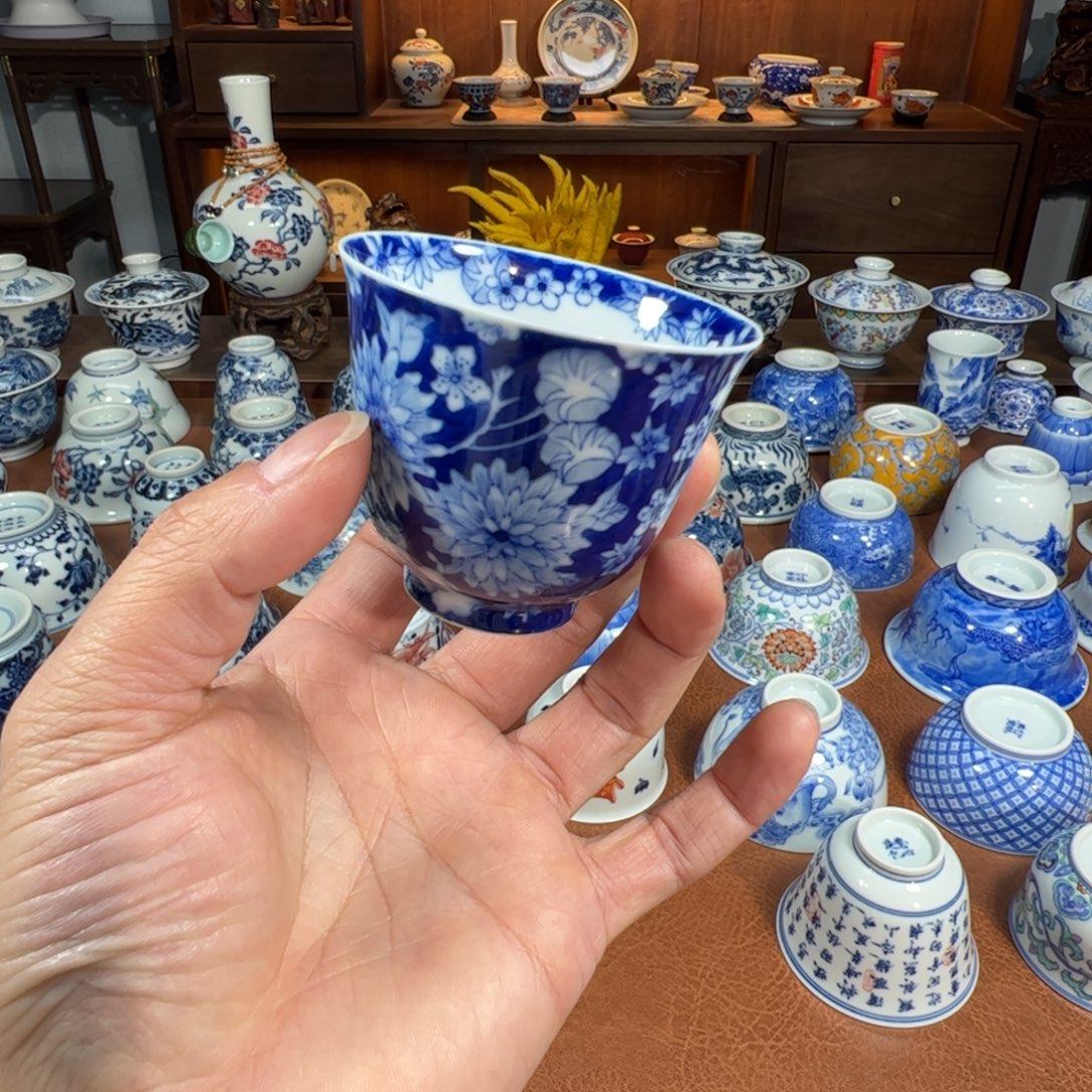 青花留白万花铃铛杯