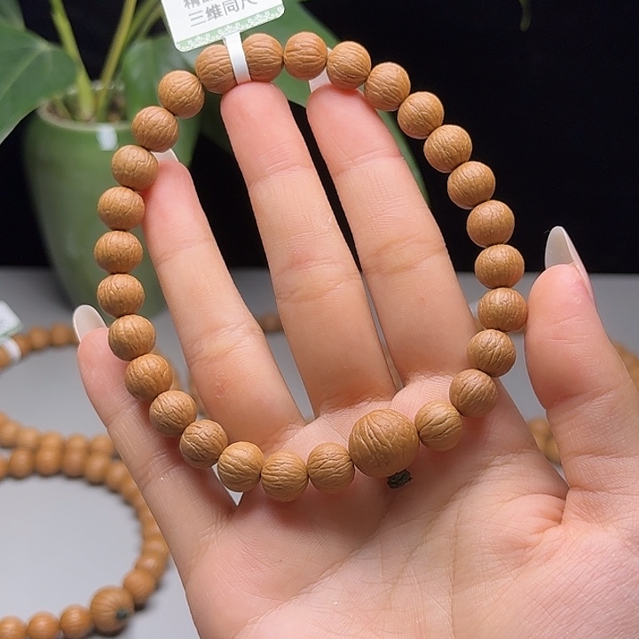 -***缘猴头核桃吊坠凤羽