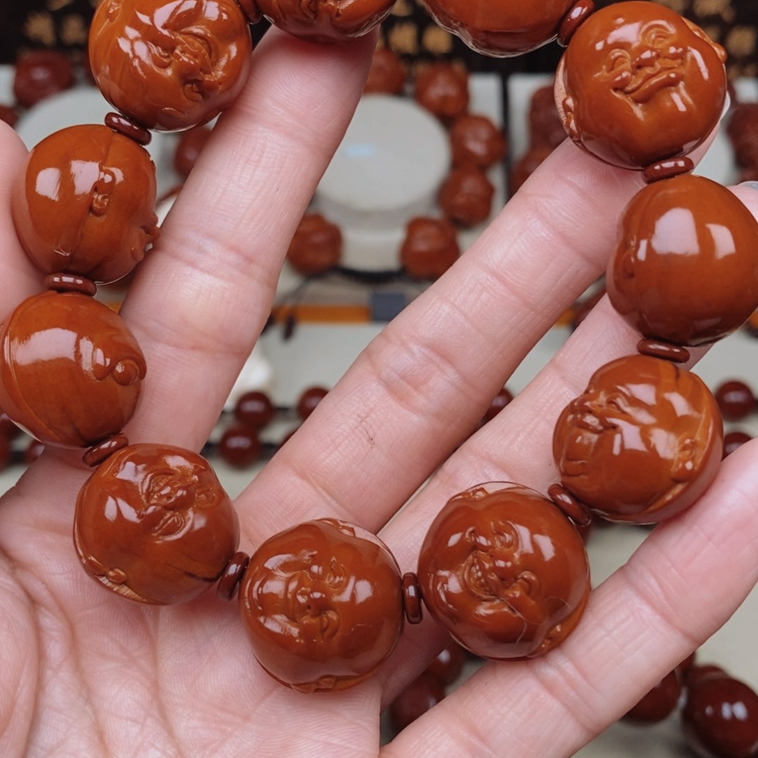 橄榄核把件缘十分开心