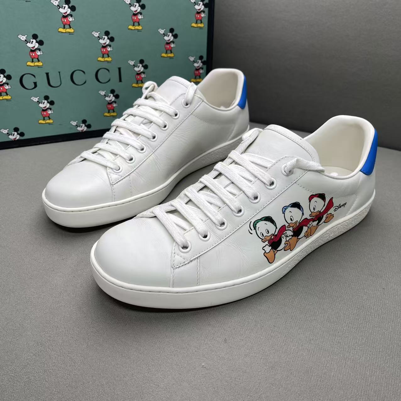 95新 GUCCI/古驰 白色时尚百搭休闲卡通鸭子印花经典板鞋 41.5码