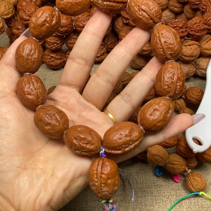 文玩核桃吊坠红皮小枣