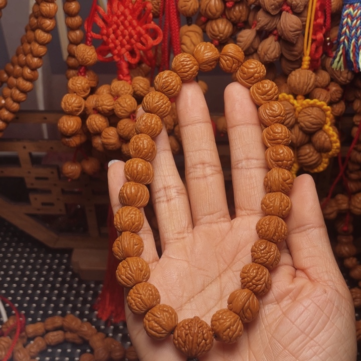 喜***木木质类龙纹桃枭挂件