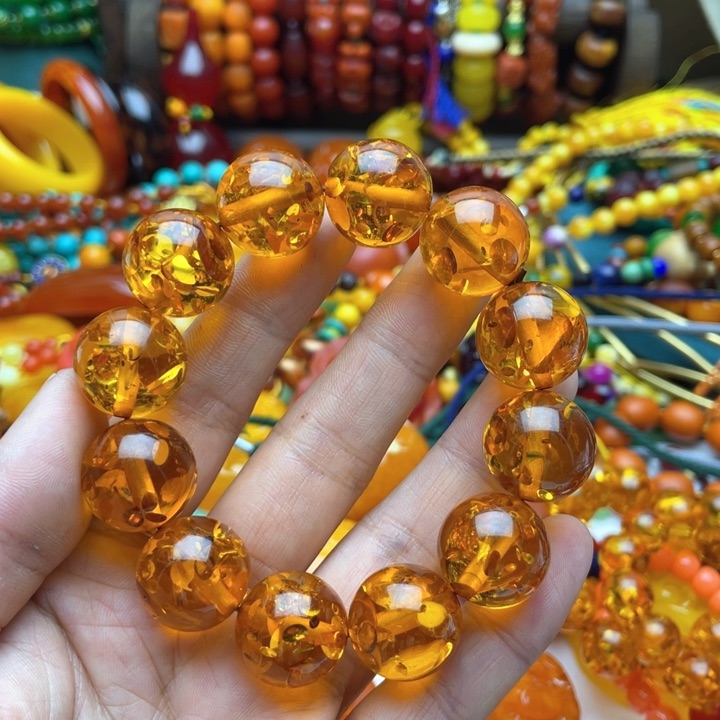 树脂制品刘*玲44号花的手串