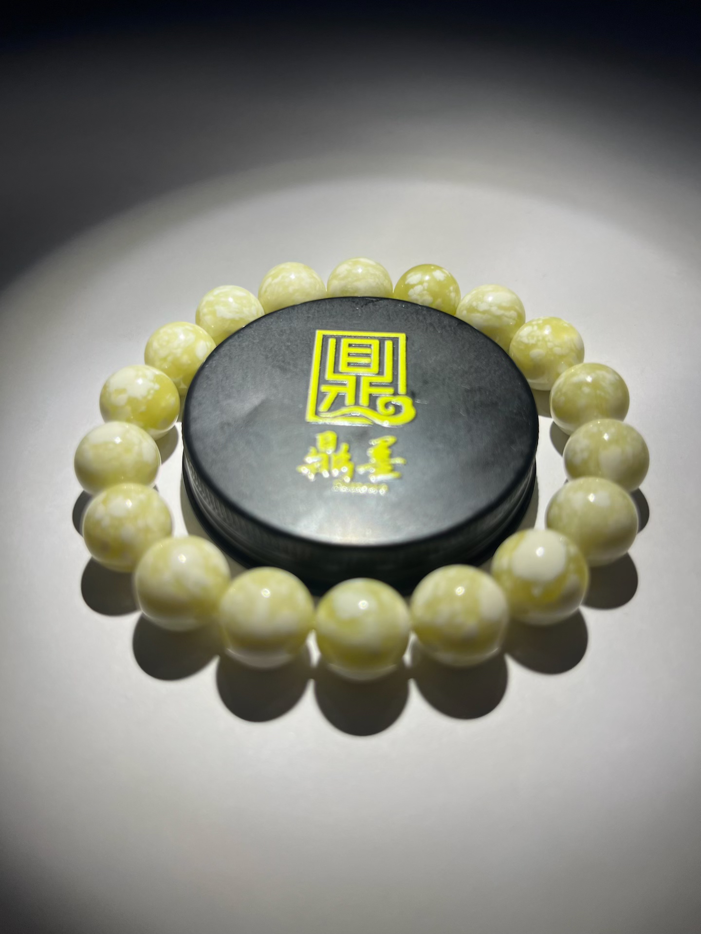 282号-尺寸1.2正圆手串-千层雪白妖纹带标