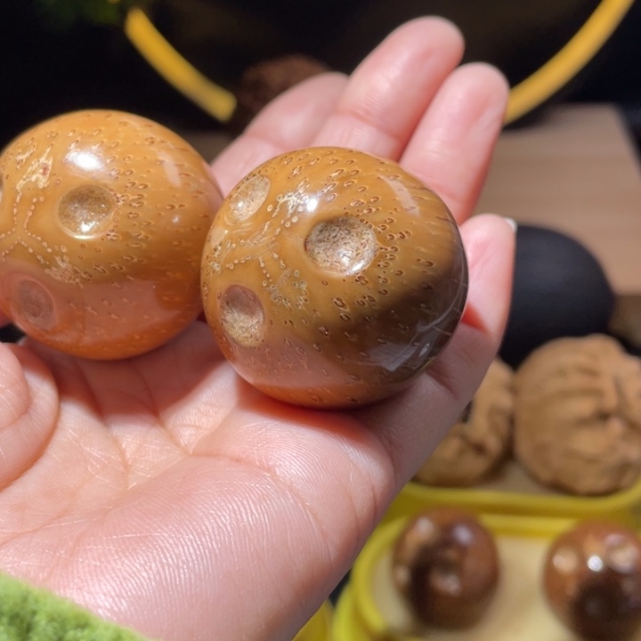 桃核把件紫金鼠手球最大尺