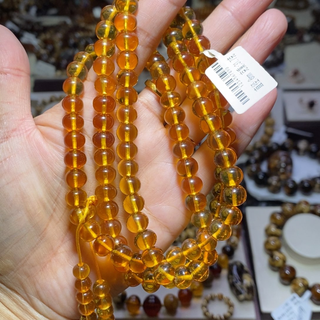 潮***哥裸石琥珀未镶嵌净水级金珀8mm