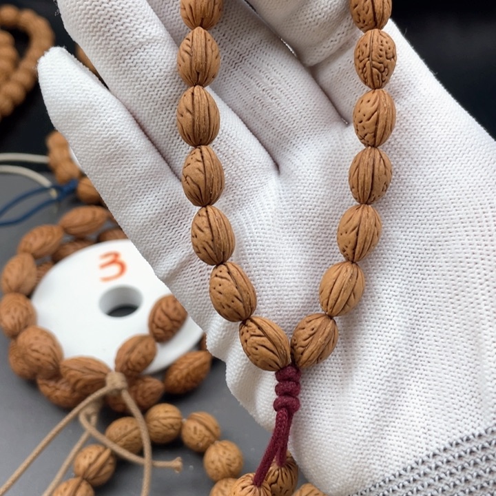 璃*0.9尺寸野生桃核手持