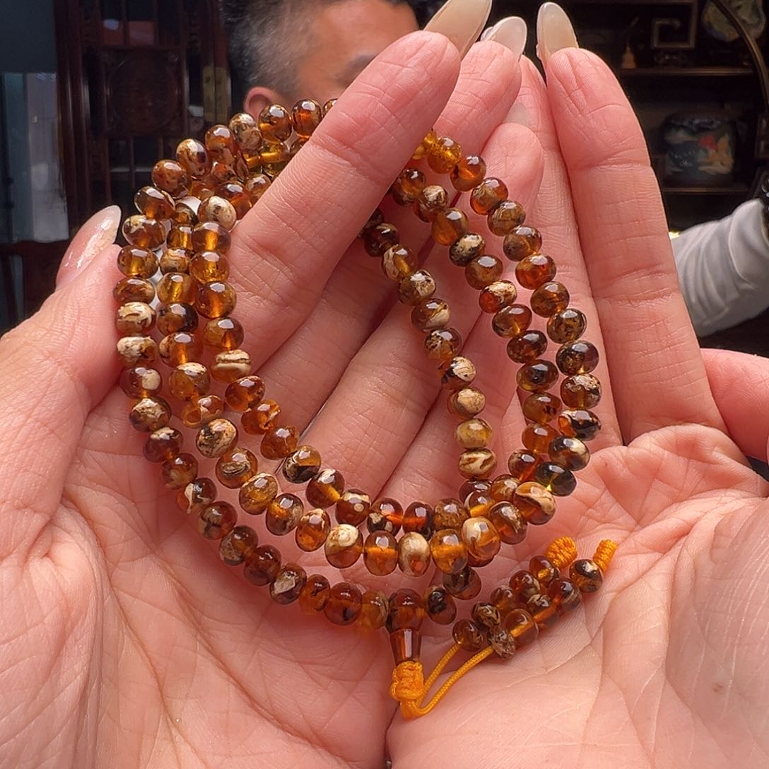 琥珀裸石未镶嵌抚顺琥珀20130。6mm