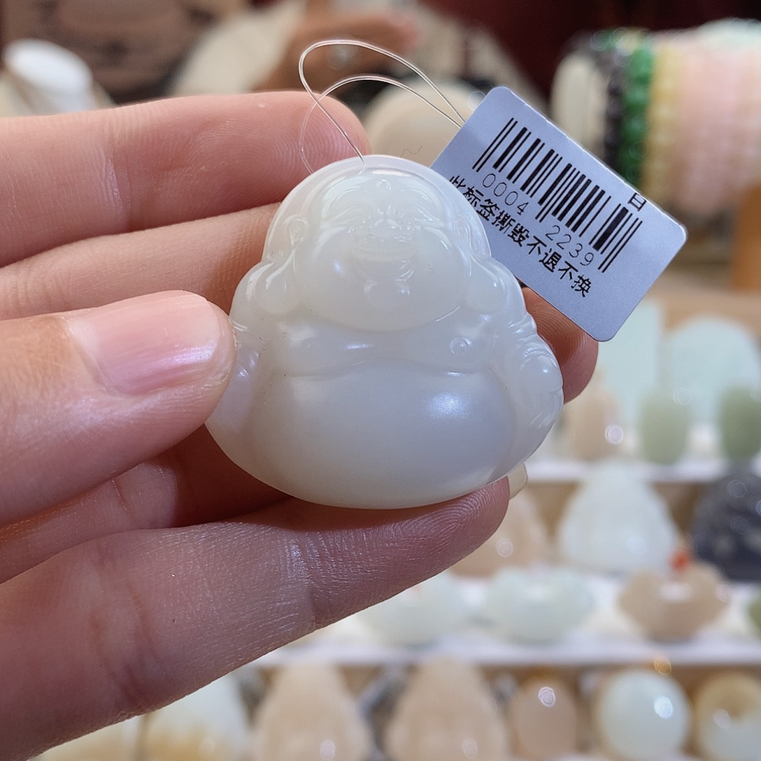 和田玉颈饰未镶嵌卷***面