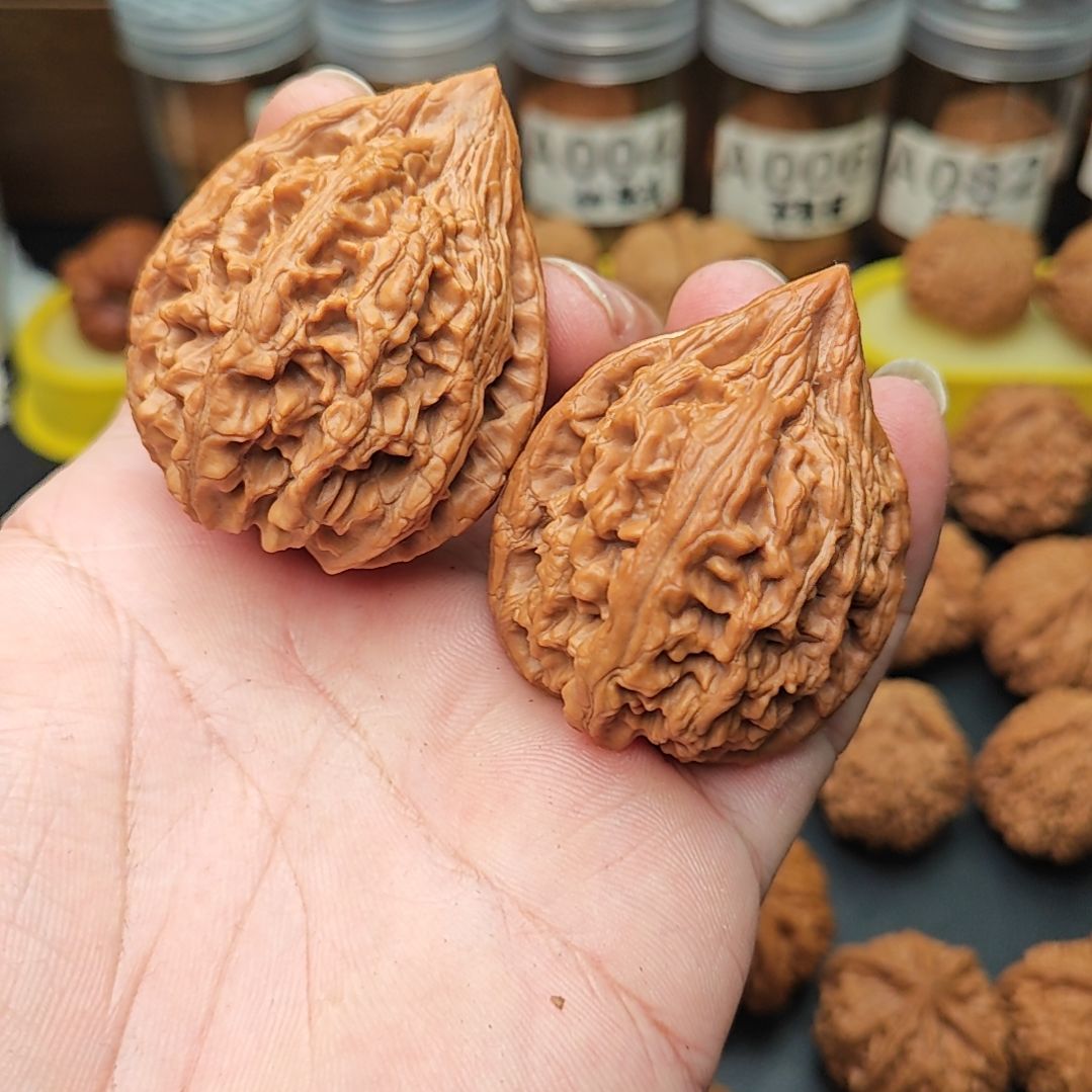 桃核把件猩****芋全品大沽石