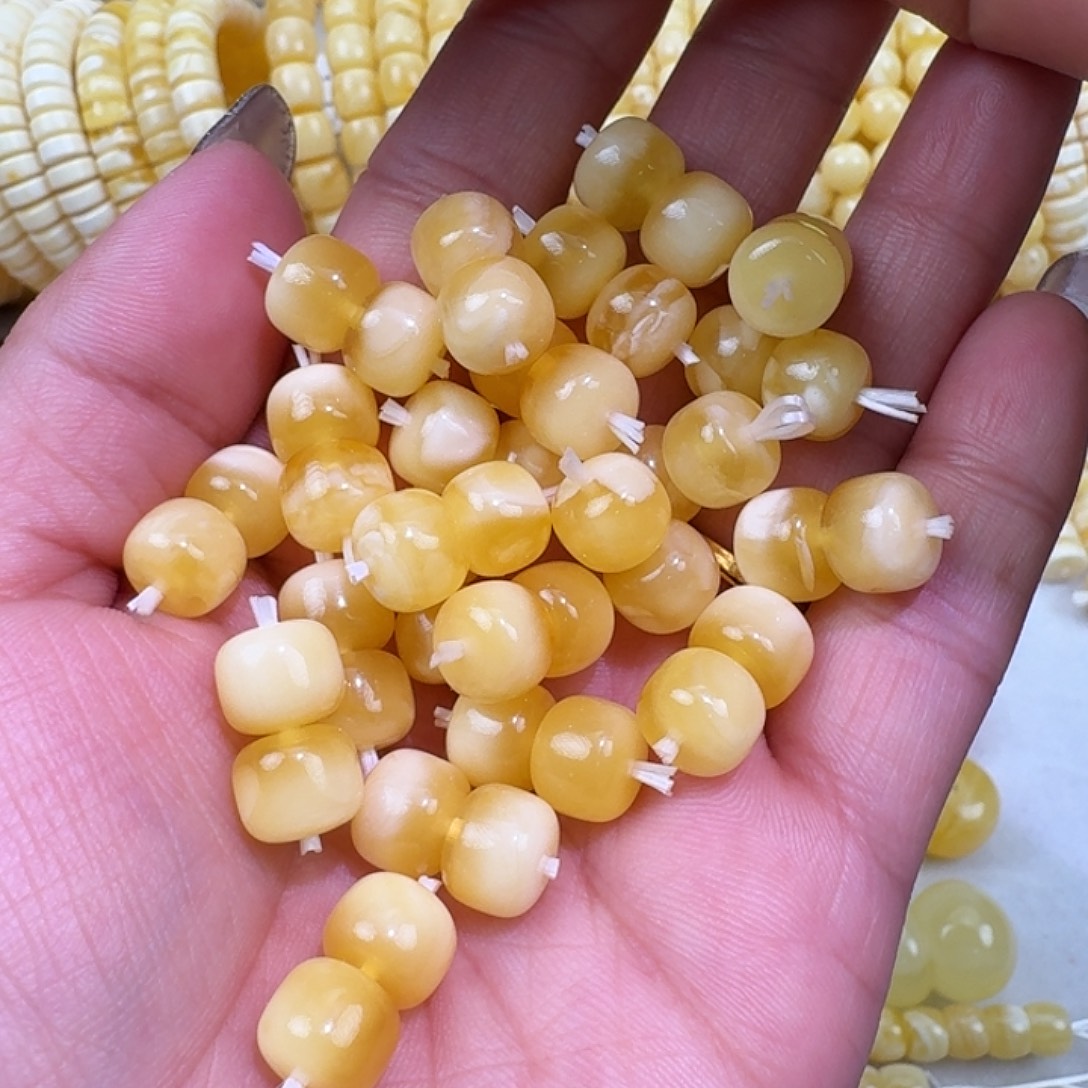 琥珀未镶嵌裸石9.4m  随机发一对