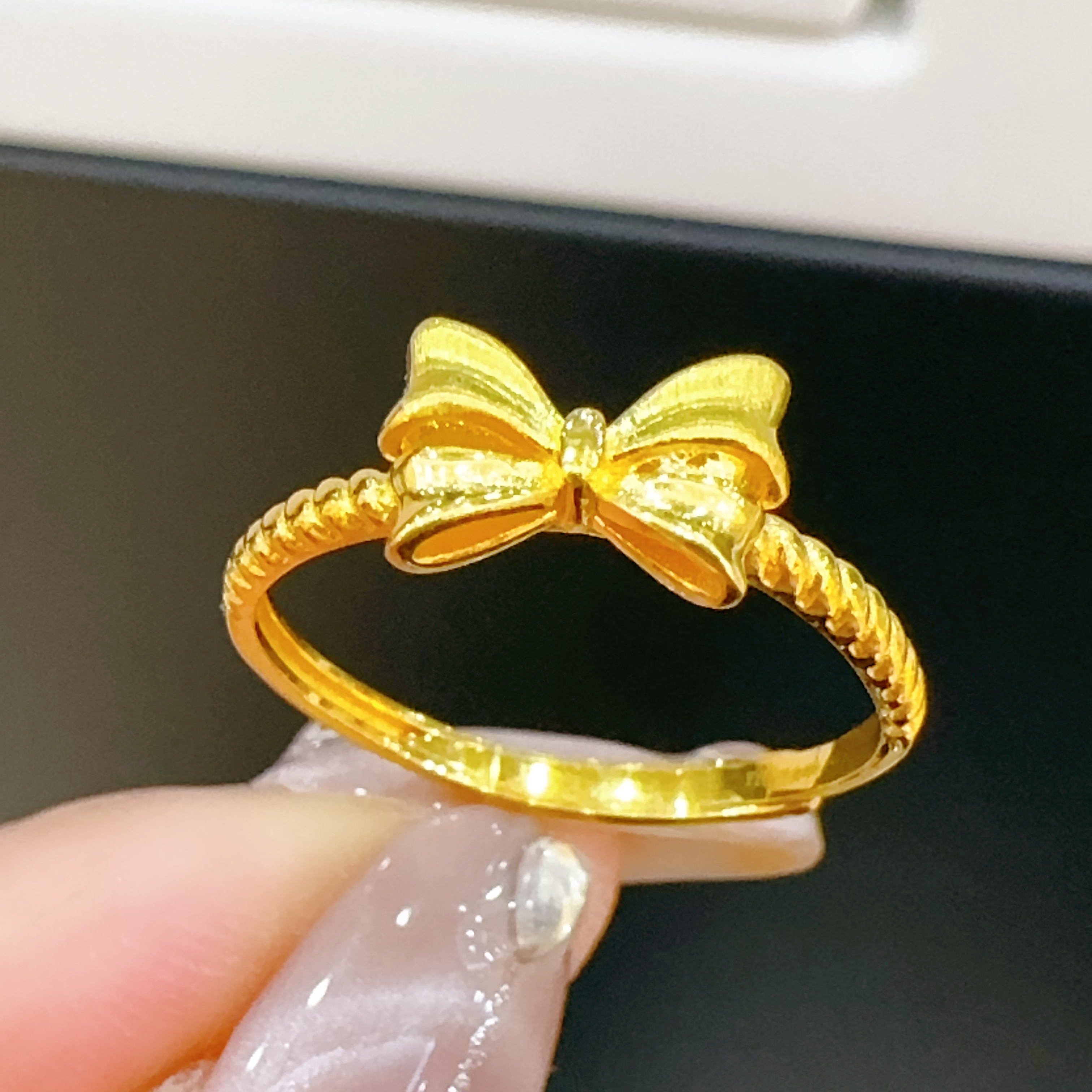 足金999 在逃公主蝴蝶结戒指2.48克