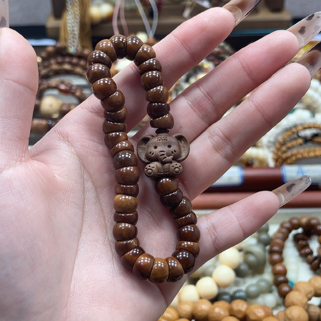 哦***.猴头核桃吊坠库克8.8diy小象手串