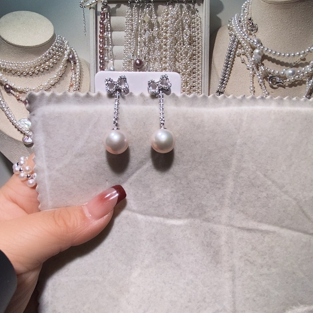 虞***鱼非金属925银纯银曼塔粉耳钉