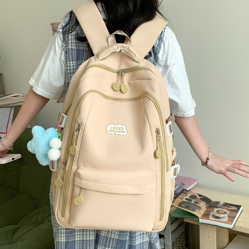 高颜值初中书包双肩通用字母减负大容量超轻书包高中生欧若智性风