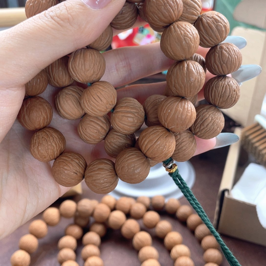 C***姐猴头核桃手串手串加绿色绳结手持，凤羽