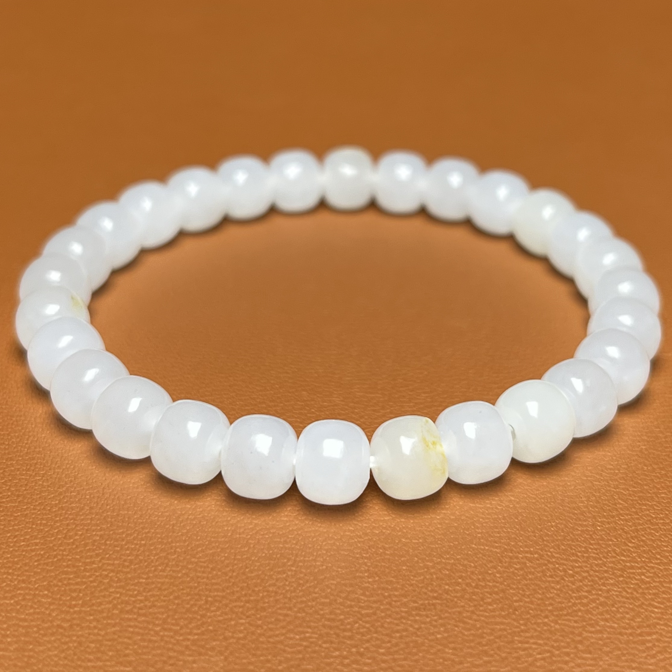 卡7*6老型手串 新疆和田玉 同料2颗留皮 高白油糯