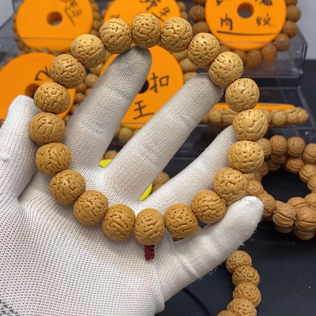 班***爸桃核吊坠老树金丹桃核手串手持奶油皮